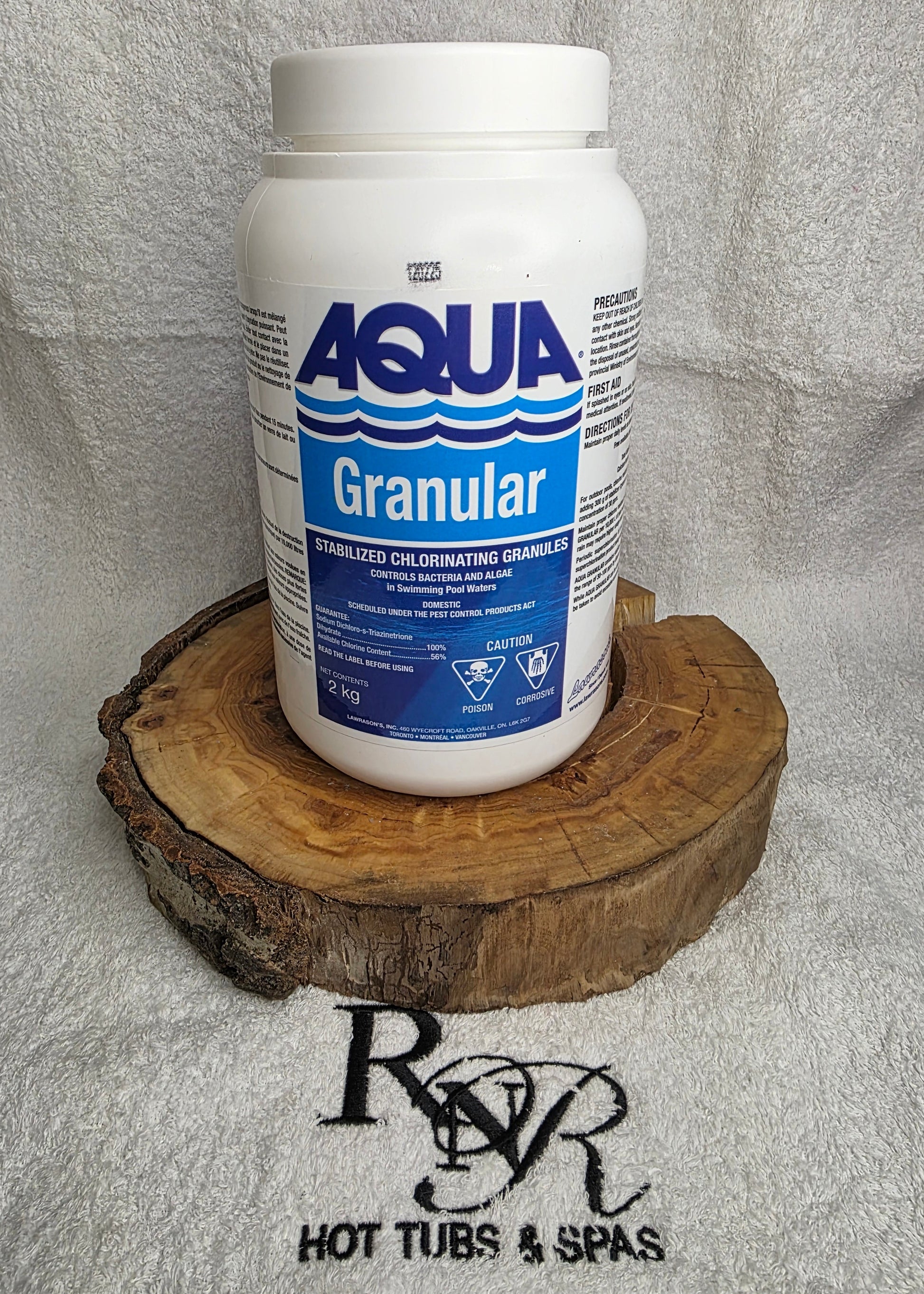 Aqua Granular product on a wooden block with a brand logo in the background