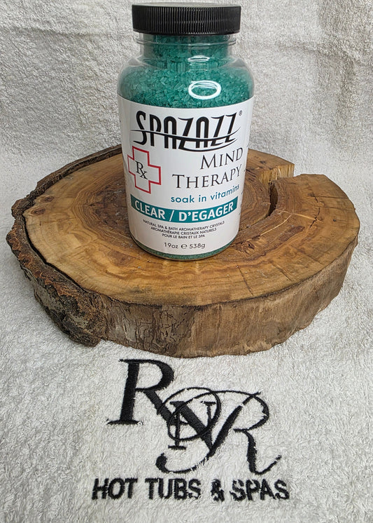 Bottle of Spazazz Mind Therapy on a wooden block with a visible brand logo at the bottom.