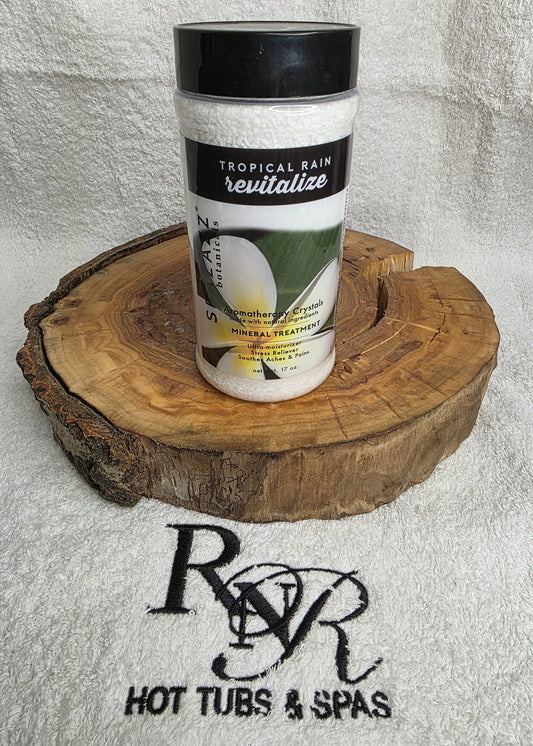 Spazazz Revitalize aromatherapy crystals on a wooden block with RnR Hot Tubs & Spas branding in the background
